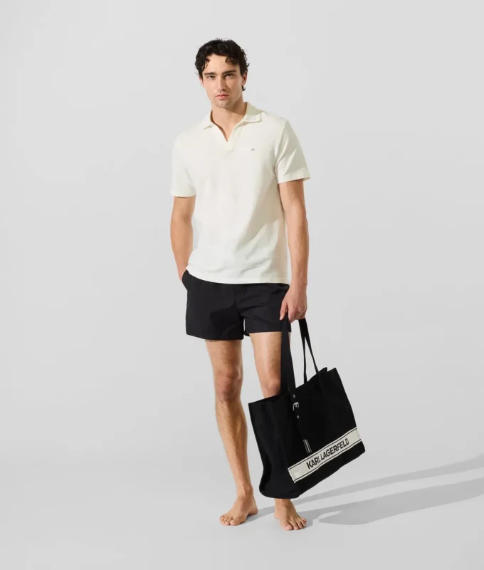 Polo con pin Monogram