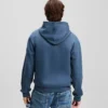 SUDADERA CON CAPUCHA Y LOGOTIPO DE PARCHE