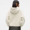 Sudadera con capucha y monograma con tachuelas