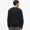Sudadera con monograma de lentejuelas
