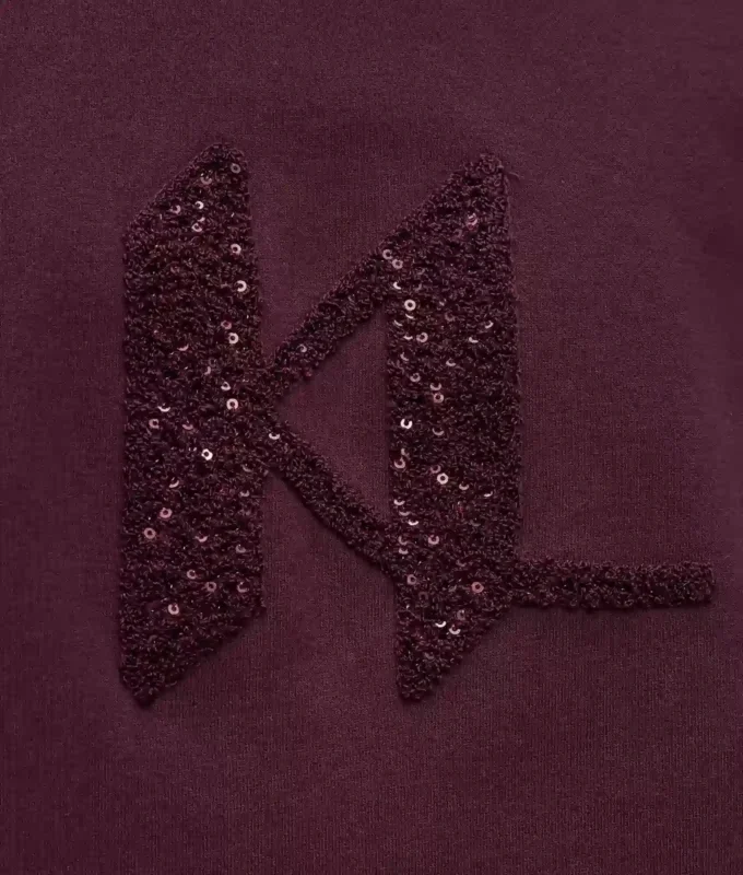 Sudadera con monograma de lentejuelas