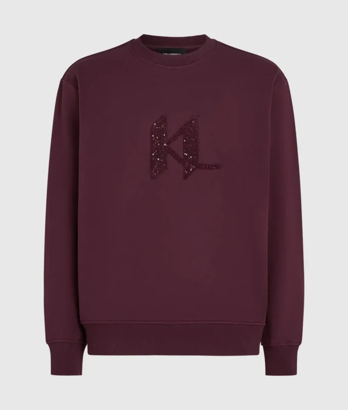 Sudadera con monograma de lentejuelas