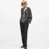 Top con estampado de abanicos