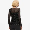 Top de malla con autógrafo de pedrería