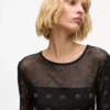 Top de malla con autógrafo de pedrería