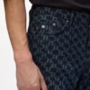 Vaqueros con estampado Monogram integral