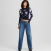 VAQUEROS RELAJADOS DE TALLA MEDIA CON FRANJAS