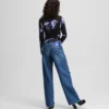 VAQUEROS RELAJADOS DE TALLA MEDIA CON FRANJAS