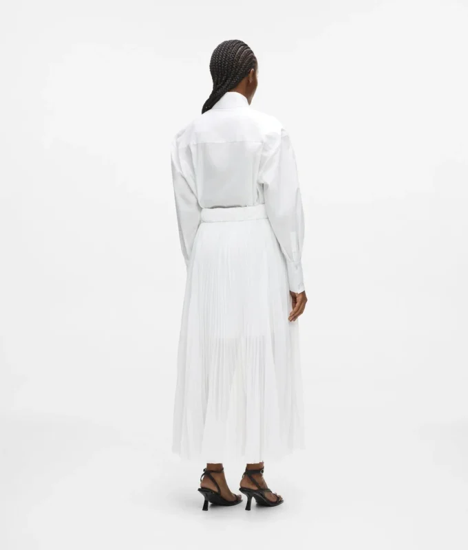 Vestido camisero con paneles plisados
