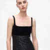 Vestido con flecos y lentejuelas