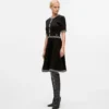Vestido de punto con detalles bouclé