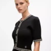 Vestido de punto con detalles bouclé
