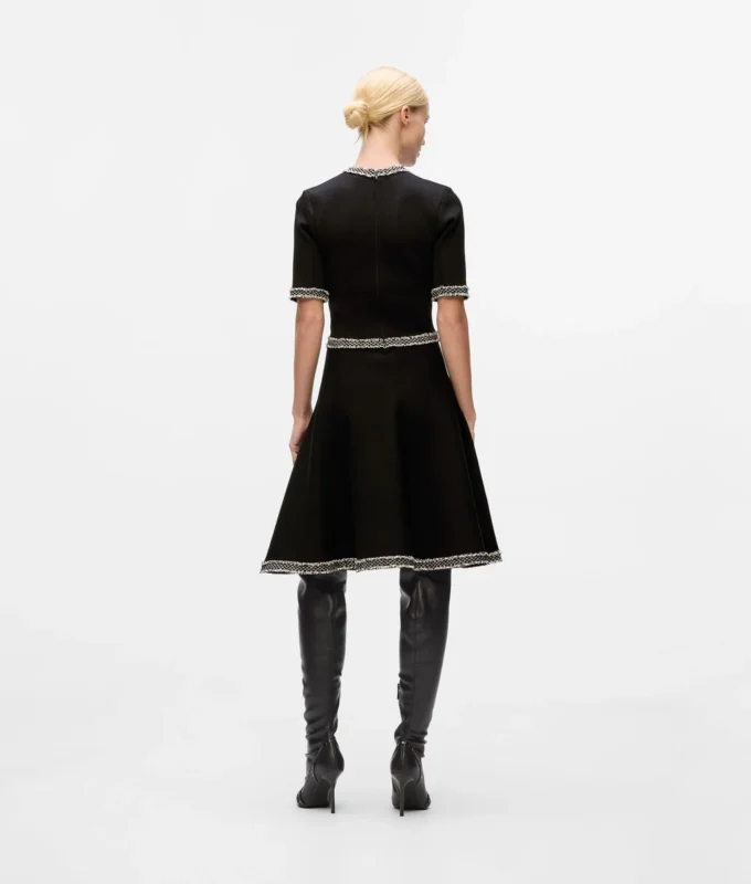 Vestido de punto con detalles bouclé