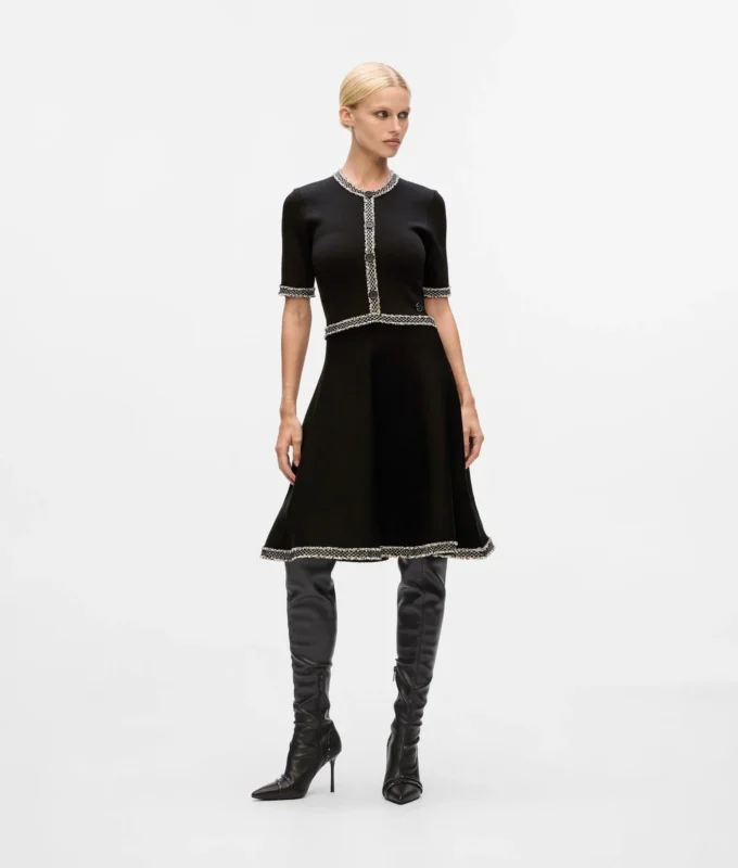 Vestido de punto con detalles bouclé