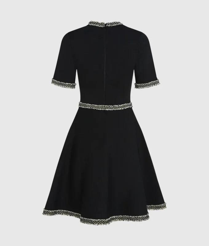 Vestido de punto con detalles bouclé